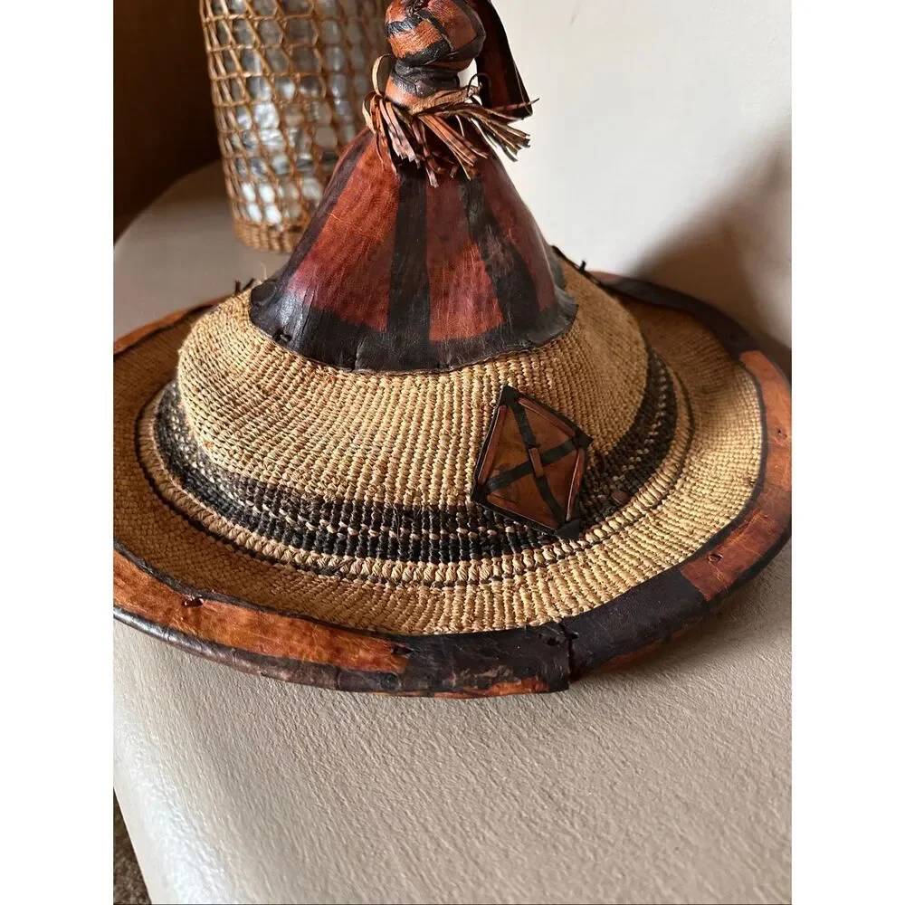Vintage handwoven basketry hat with leather trim. Tribal/Boho decor
